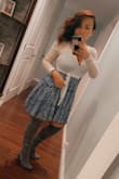 This was such a flirty and fun dress! Very comfy and feminine. I paired it with boots and a white wrap during a chilly night in L.A. - Lilly D.