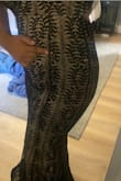I love the dress but I think they one I received had been previously worn. There were two holes that I noticed and signs of wear at the seams... but the dress is beautiful with a great cut. - Caitlyn C.