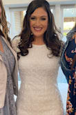 This dress is definitely cute. However, it was pretty see through even with a white bra and underwear. I wore a Spanx to help with that. I also think it's very "boxy" or square. I had the front taken in with a seamstress which gave me a waistline. I wore this for my bridal shower and everyone said I looked like a princess haha! Probably could've gotten a small but the medium worked. - Melissa W.