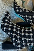 These boots are true to size, so comfortable too! The pearls and gems are just stunning and the bottoms are a Tiffany blue! - Vanessa P.