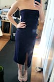 Wore this for a wedding very comfortable, material has some stretch and weight to it hugs the body just right. Took a little off the bottom for bit if a shorter look, deff was too long for someone my height. - Kimberly M.