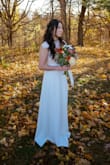 Got this dress to wear for my elopement and it was perfect. I read the reviews and sized down to xs. I'm normally a small and the xs for perfect. So I would recommend sizing down. The length was a bit long for me but I'm about 5'4. The dress was beautiful. - So H.