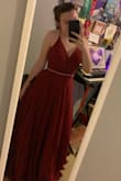 It's very comfortable and padded so you don't need a bra. The back tightens so you can get a super good fit! The slit was a little higher than I thought, but the dress overall is beautiful and makes me feel like a princess. The pictures are from the first time I put it on, so the tags are still on the dress (which is why there's white and black squares dangling haha). Love this dress! - Brielle A.