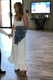 I looove this dress. It's incredibly flattering, and very comfortable. I love that it's lined so you don't have to worry about seeing through the white material. I wore this to my rehearsal dinner and got lots of compliments. - Alex C.