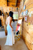 I ordered a Small. It fit like a glove. I am pretty tall at 5'6 and wearing 3 inch heels, I still got it about an inch taken in on the bottom. 

It was everything I wanted. - Yesica J.