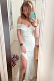 I love this dress so much. The material is thick and does not feel cheap. It's beautiful for any occasion, I bought it for my December elopement at the courthouse! I cannot wait to show my fiancé it. It came pretty wrinkled so you will most likely have to iron it! I bought a belt from a bridal shop to pair with it! It's perfect. - Samantha R.
