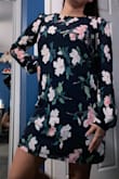 I would say I bought it on clearance and it's kind of tight. You do want to consider going your size (if you know it won't be tight) or one up. In general, it's a nice dress! - Astrid A.