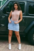 This skirt fits perfectly! It's super comfortable and gives such a beautiful shape to my body! It's length is great, not too short not too long! I get so many compliments! - Kaylin C.