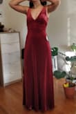 Nice quality, lovely color, flattering fit, a great dress. It is certainly floor length. I'm about 5'4", but wearing 4" heels under there. If you're a bit shorter, you might need to do a bit of hemming or invest in platform shoes. Whatever fits your vibe. The dress is unpadded (having no chest, that's no issue for me), but I think you could easily find a bra that fits the cut of the dress. While it's a low neckline, it's not super plunging either. I wish I could give you my waist/hip measurements but I honestly don't know them. Just know this dress is hiding my thunder thighs while giving me some shape. But, I don't think this dress hides tummy pudge very well. Granted, my significant other says it's not noticeable, so maybe yours will say the same. - Elsa K.