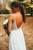 Alterations needed for length only. I'm 5'0" so that was expected. Great fit otherwise. I wore this on my wedding day and no one believed that it was from Lulus! I got a lot of compliments. Love this dress <3 - Nina H.