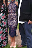 I wore this to my daughter's graduation and it was beautiful. I bought an xs, it was a little tight but that was ok for me. The material was great and looked very sleek. - Jennifer D.
