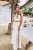 I went through 4 outfits before I found this gem for my bridal shower. I wanted something feminine but also not too over the top. This two piece set is amazing. The skirt part fits perfectly, not too loose and not too tight. Same with the top and the top has adjustable straps with a tie in the back (best worn without a bra, if you can swing it). I'm between 5'5" and 5'6" and the length was perfect even with a 3 inch heel. If you're shorter, it would be wise to hem it or wear super tall heels! Overall I LOVED this outfit and would recommend to anyone. - Alexandra W.