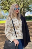 Thick, high quality knit. Sized up to have a slouchier fit. Very impressed by the quality. - Meagan C.