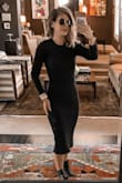This sweater dress fit perfectly and is super chic. The fabric is thick and not itchy at all. The quality feels high end. Love it! Perfect fall/winter staple to dress up or down. - Ellie D.
