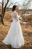 This dress was EVERYTHING!! We decided to elope and this dress was perfect for November. I had it hemmed & cups put in (no support or nip coverage up top.) I wore purple leggings and they didn't show through bc the bottom is very well lined! Obsessed. So many compliments. Felt like a fairy goddess on my wedding day! Photo: Angela Divine Photography - Samantha C.