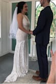 Loved loved loved this dress for our elopement chapel wedding. I was comfortable in it all day as we walked around the city celebrating our ceremony. 
It's a creamy off white but doesn't look cheap at all even with the bottom seam showing. I received many compliments = - Jessica V.