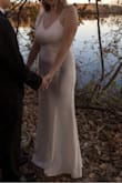 I bought this dress literally two days before my mini elopement. It's really well made and fits beautifully. The medium fit me very snug and it was a little sexy. It was totally perfect for our simple ceremony. - Tina G.