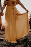 Definitely could've used to have it hemmed since I was barefoot for my photos, but it worked out perfectly! - Anna G.