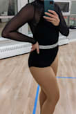This bodysuit is super cute, versatile and comfortable! The fabric has a really nice feel. I ordered a medium after reading reviews and checking the size chart, and it fit great, albeit with some room in the armpits as some other reviewers noted - but it wasn't a dealbreaker. Wore on its own for a dance costume, and received many compliments! Can't wait to style it with a skirt or high-waisted pants for some outfit options. - Olesya S.