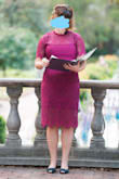 This dress is extremely comfortable for all-day wear. I wouldn't order a size up because then I think the form-fit would look weird. I felt comfortable and cute in it but in the photos I look like a blimp; ah, well, that's just where my body is at! I too was the wedding officiant and if I could do-over would probably have gotten the emerald green or black for greater photogenic qualities. Bride and bride's mum both complimented me as well as tons of others, though, so yes you can't go wrong. I did wear it with a black one-piece body suit underneath. - Samantha H.
