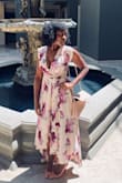 This is my favorite little dress! I absolutely love it. I ordered an extra small. And I still had to have it altered quite a bit. It runs large, not meant for petite women unless you want to get it altered. So many compliments on this dress. - Janayia R.