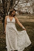 This is a gorgeous dress! Fits a little tight on the waist but I carry weight in my tummy, the slit makes it very airy and elegant. - Shalene B.