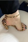 They are very cute and look great on but I will say they are tight on the strap that goes across your toes and cut into the feet a little bit. I'm hoping they will stretch the more I wear them. - Brittany M.