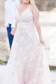 Very pretty. Wore this for a photo shoot on what was supposed to be our wedding day that was cancelled due to Covid. It photographed beautifully. Fit nicely everywhere except the length was quite long on me, but worked fine for the shoot. - Debi P.