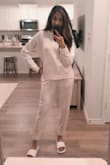Love love love. The material is super luxurious and comfy. I am usually an Xs but the S fits amazing. It's suppose to be a little lose because it's loungewear. Looks amazing - Khadija N.