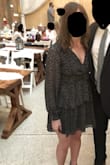 Really loved this dress and am happy I ordered it! The cut is very flattering - its not too tight on your stomach but fits snug a couple inches below the bust - giving it a nice shape. The sleeves were nice and flowy and the cuffs on the wrists weren't too tight but fit well. The only reason I gave it 4 stars is because the V neck is quite low (though I have a relatively small bust that doesn't always fill out dresses). My bra was showing with how low the cut was, but I simply added a few stitches a couple of inches higher and it is now perfect. Would definitely recommend! - Sarah V.