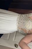 I had been eyeing this dress for months but I was a little skeptical on ordering a wedding dress online that I had no chance of trying on before buying.. but let me tell you, I'm soooo excited I did! I'm absolutely in love with this dress, the detail in the beading is gorgeous & very sparkly! The straps will need taken in a tad bit but overall I 10/10 recommend this dress! I will be having a small elopement ceremony in Denver next March & I'm so excited to know I will look beautiful on my big day! - Andrea O.