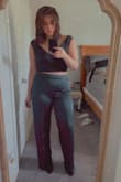 I ordered this in a Medium thinking it ran large because that's what other reviews have said. It fits fine. I wish I would've ordered it in a Large though. Definitely keeping it and will still wear it, but I think it fits more true to size than previous reviews have said. I'm an average build and size. Size 8-10 in pants and M-L in tops. - Breanna R.