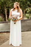 We had to change our wedding plans due to Covid, so I thought this dress would work for our small ceremony, and I was right! It was absolutely perfect, and I actually didn't have to wear a bra with it! The band across the waist has no give/elasticity, so if your more apple shaped like me (more weight on top) it might be a little tight. But I was still 100% comfortable, and I'm someone who doesn't like to wear anything too tight. I'm 5'7" and it was just grazing the ground with my ~3" shoes, so shorter people may need to hem. I would definitely recommend this dress! - Catherine D.