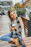 This is such a cute sweater to throw on with jeans/booties or even sweats and the off-the-shoulder is an adorable added touch! Sooo soft, and the color is the perfect neutral - not too tan and not too pink. And it doesn't slide or "come off" of you. I purchased a size M and I'm glad I did (instead of my usual S) since it does run a little short. It's not a crop top by any means and can still be tucked into jeans for a cute look, but it's just not a "long" sweater. - Meghan S.