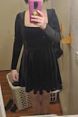 The fabric is quite soft which I love and the dress is very comfy to wear all the time but people weren't kidding when they it was short but it was little bit of the knee but I still love it. - Trinnity C.