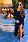 I wore this dress in 40 degree weather and it was perfect! It is very heavy material and it runs big. Not a good summer dress by any means but perfect for fall and winter. - Gabriela P.