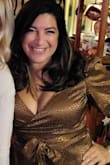 This blouse fits pretty snug so order a size up. I love the blouse and it goes well dressed down with jeans or dressed up with a skirt or pants! I wore this for Thanksgiving and received many compliments. It also has a sexy look too - Marisol C.