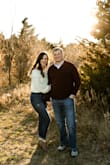 I bought this sweater for my engagement photos, and it was so cute even the photographer wanted to know where I got it! Designed to fit oversized so no need to size up. The bottom rim of the foldover neck is a little tight, so it is a little tougher to raise your arms. This sweater isn't quite as short as a crop top, but is a little on the shorter side and looks great with high waisted jeans! - Tess H.
