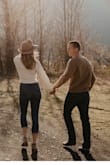 I bought this sweater for engagement photos with my fiance.  I initially was going to pair it with a high waisted satin skirt as pictured on the model, but went for a more casual look so paired it with jeans.  I do recommend jeans with a 9"-10" rise, as my "normal" high waisted jeans weren't high enough and it showed my stomach.  The color is more white than cream.  I was happy the sleeves were so long, with my height it is sometimes hard to find sleeves that are long enough.  The bell sleeves gave it a fun flare too! - Rochelle D.