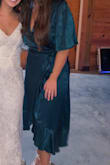 This dress is absolutely GORGEOUS! It's the perfect wedding guest/holiday dress. The chest area was a little big, but I just pinned it and it was perfect! 100% recommend! - Rachel H.