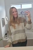 I absolutely love this sweater and wear it all the time! It's slouchy, but not too baggy. I was scared to wash it based on some of the reviews, but I've washed it once in cold water and let it air dry and it didn't shrink at all. Fits exactly like I want it too. - Shayna B.