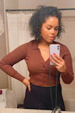 This is super high quality and the material is a nice thickness. The crop is at the perfect length. I highly recommend this.  I sized up on this one because I was worried the arms would be too tight.  Normally I would order a medium of it was a lulus brand item. In this case, large Worked out great. - Joelle H.