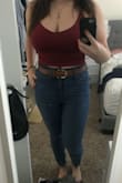 Love the material of these, got it in three colors! Material is nice and stretchy, definitely form fitting to the body. I could probably do a small, but I guarantee it would probably roll up on my stomach if I did. I wouldn't say it's supportive (especially for my size) and my boobs definitely don't fit in the allotted cup area that the material creates, but it's still cute enough to wear by itself. I give this top 4 stars because of the way the straps lay on me. I guess I may just have broad shoulders, but the straps almost don't want to stay on my shoulders. It seems like the back stretches out more than the front? Maybe that's why the straps fall off so easily? Not sure, but nothing a bit of altering can't fix. Besides that, I love it. This top will be perfect for hot summer days here in Texas. - Megan W.