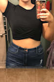 Material is stretchy and not very thick. Cute, fun crop top! - Meagan M.