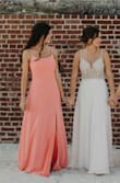 This dress was everything I wanted and more. I got married on the beach and it fit the part. I did have to get it hemmed so I didn't trip over it and I work a bra to do some smooshing. But people ranted and raved over it. It fits like a glove. I normally wear a small everywhere else except lulus I wear an XS. So go with either what you normally order or size down a little. Exchanges are so easy on here too. I've added photos to help out. And when I weighed a little more in still fit great. I added a close up shot of the back so you can see more detail. The beads are rhinestones and then little opal-y beads as well! - Michaela F.
