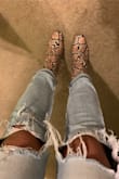 These shoes are gorgeous, but I agree with an earlier review saying it is tight around the ankles. If you have muscular calves like me, just be aware that it may be tight at the top. I just unzipped the zipper slightly at the top and that pretty much fixed the issue for me, so it was worth it to keep these! - Allison H.