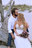 I never planned on wearing a strapless dress to get married but I ordered this on a whim along with 6 other dresses to try on and this was by far my favorite. Very comfortable and I'm happy with how it turned out in the photos. Would suggest though for those who are bustier to use some double sided tape! - Ellis P.