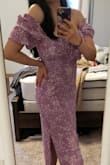 Totally understand why I've seen this dress on IG and youtube. It's amazing! The cut is so flattering and the sleeves look great up or down on your shoulders. Its effortlessly cool and romantic at the same time. - Jaynel C.