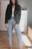 I've worn this almost everyday since I've had it! Seems a little bigger than than expected if I wear a tank underneath, but fits true to size with a long sleeve/light sweater. - Sammie M.