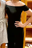 Fits super tight, but flattering. Really cute and comfortable. I'm 5'8" and wore it with 3 inch heels and the length was great. - Ceili C.